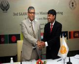 Shri Ravindra Singh, Secretary, Culture, Goverment of India greeting a foreign delegate at the official level meet of the 3rd SAARC Cultural Ministers summit.